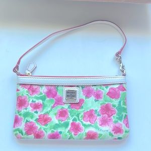 Dooney & Bourke clutch with short strap.